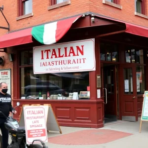 Exterior view of Buona Forchetta with community members gathered outside