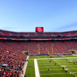 Fans enjoying a themed football game at Snapdragon Stadium