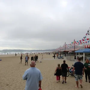 Visitors at a cool San Diego beach with cloudy skies