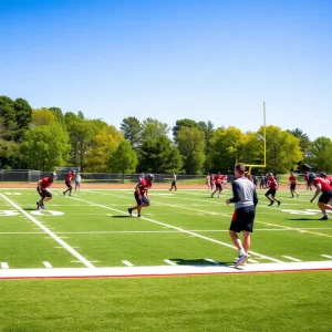 SDSU football players practicing on the field