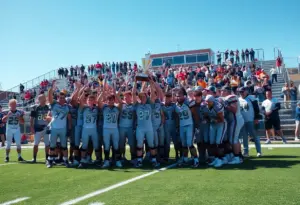Football team celebrating CIF San Diego Section Championship victory