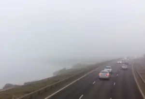 Coastal highway in San Diego covered in dense fog