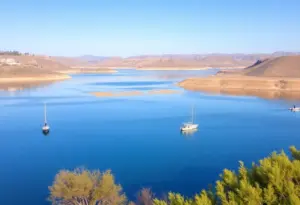 Low water levels at Loveland Reservoir with fishing boats