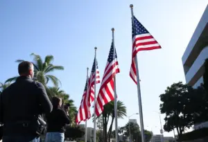 Flags at half-staff in San Diego representing solidarity and accountability.
