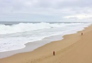 High surf conditions at a San Diego beach during an advisory.