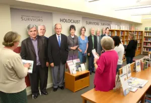 Life-size cutouts of Holocaust survivors at San Diego library exhibit