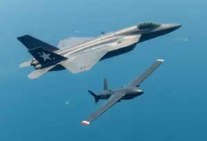 F-35C fighter jet and Iranian drone in conflict over Arabian Sea